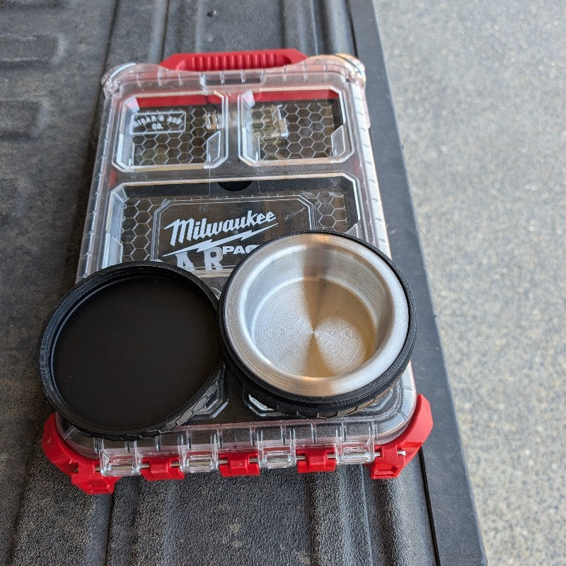 Open stainless steel modular ashtray attachment with removed cap mounted on Milwaukee Packout 48-22-8436 organizer lid